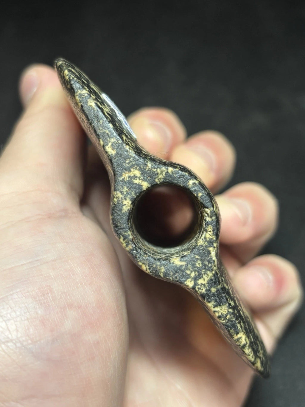 Speckled black and white bannerstone from Crawford County, Missouri — view 2