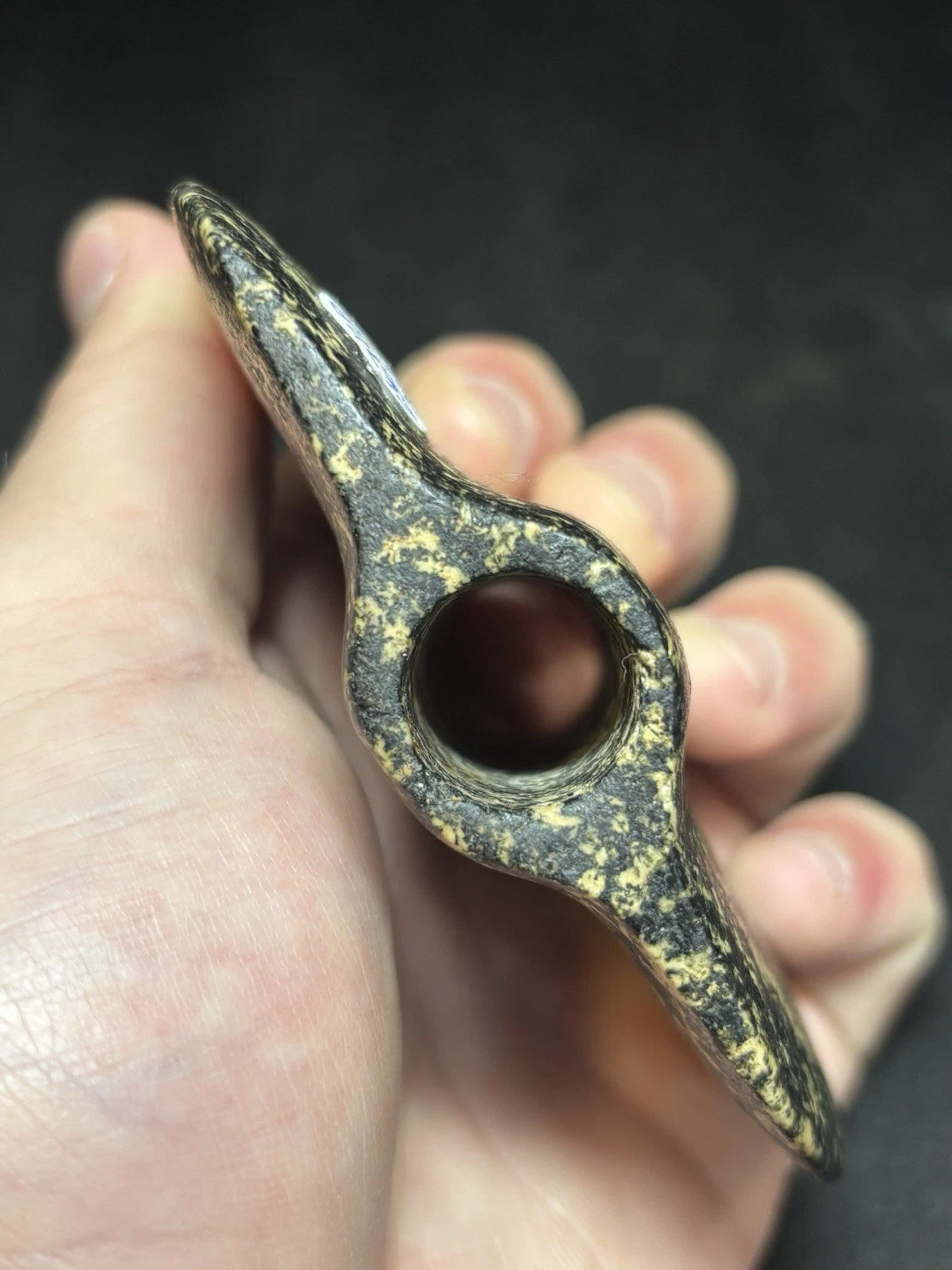 Speckled black and white bannerstone from Crawford County, Missouri — view 2